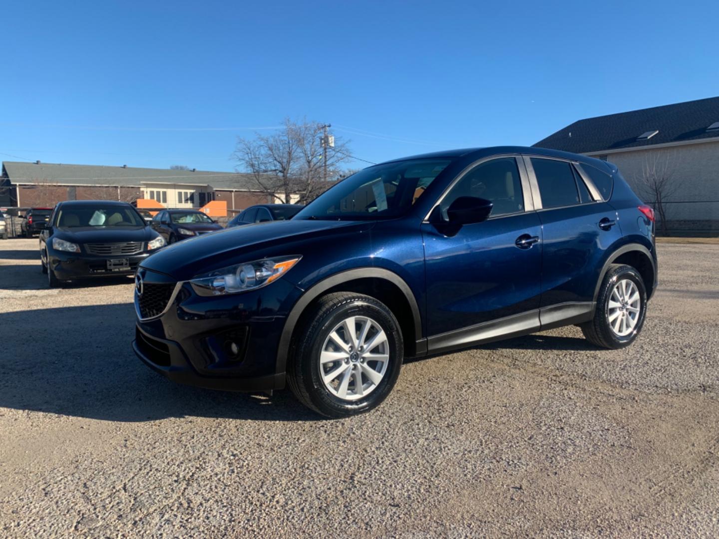 2014 Blue /Tan Mazda CX-5 Touring (JM3KE2CY1E0) with an 2.5L L4 DOHC 16V engine, Automatic transmission, located at 1830 North Belt Line Road, Irving, TX, 75061, (469) 524-0199, 32.834373, -96.993584 - Photo#1